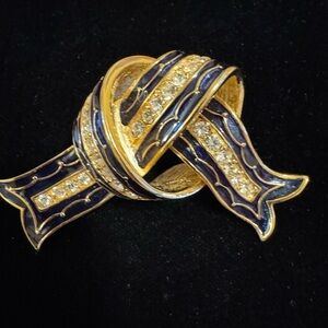 Vintage Joan Rivers indigo enameled & rhinestone on gold tone bow brooch